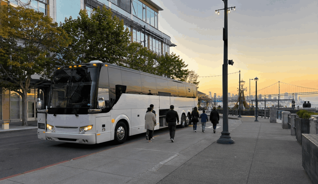 group arriving by charter bus near the alameda waterfront for a museum visit