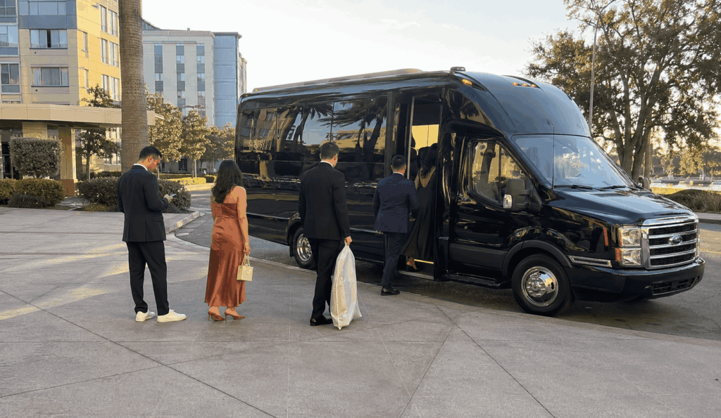 wedding guests boarding a shuttle outside a bay area hotel before a ceremony in alameda