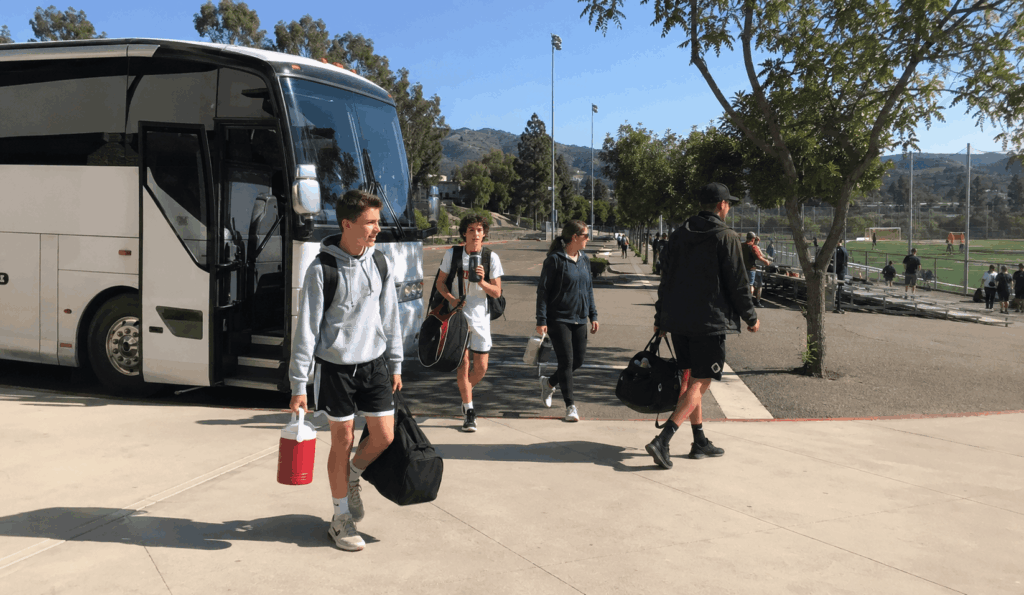 youth sports team arriving by charter bus at a bay area tournament venue after leaving alameda
