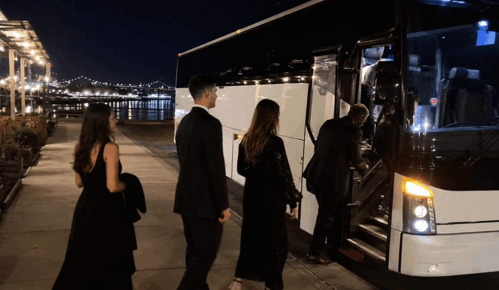 bay area wedding guests boarding a shuttle after an evening reception near alameda