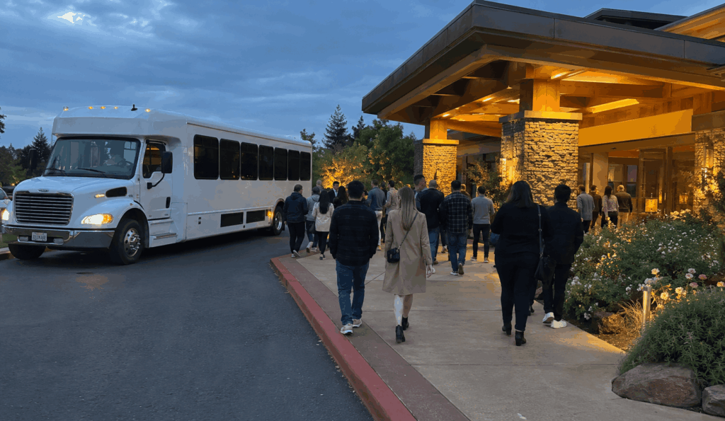 group boarding a charter bus outside a casino resort after an evening outing in northern california