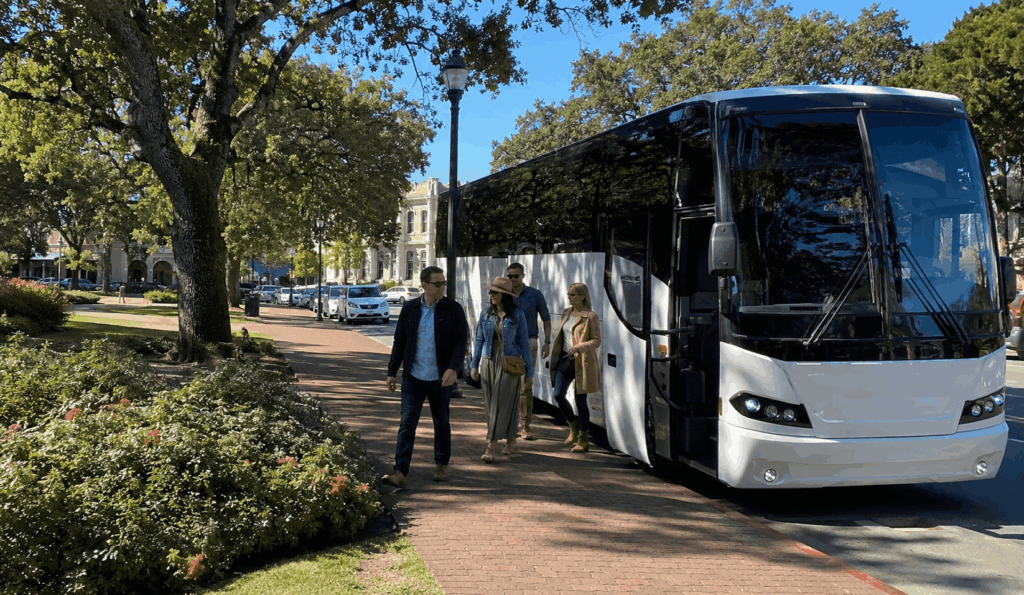 charter bus arriving with a group near sonoma plaza for a sonoma wine country day trip from alameda