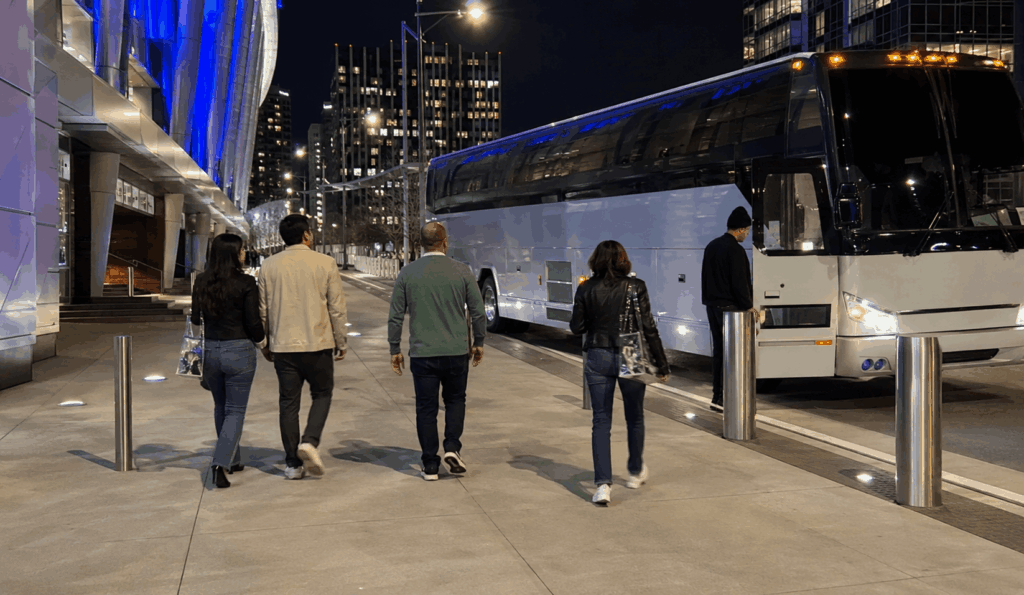 charter bus picking up a group outside chase center after a warriors game or concert in san francisco