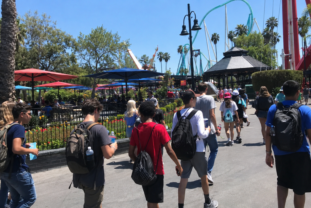  families and youth groups enjoying a day near roller coasters and attractions at california's great america in santa clara