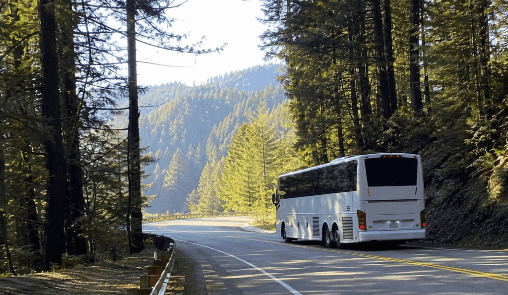 charter bus traveling through the santa cruz mountains on the drive from alameda to santa cruz