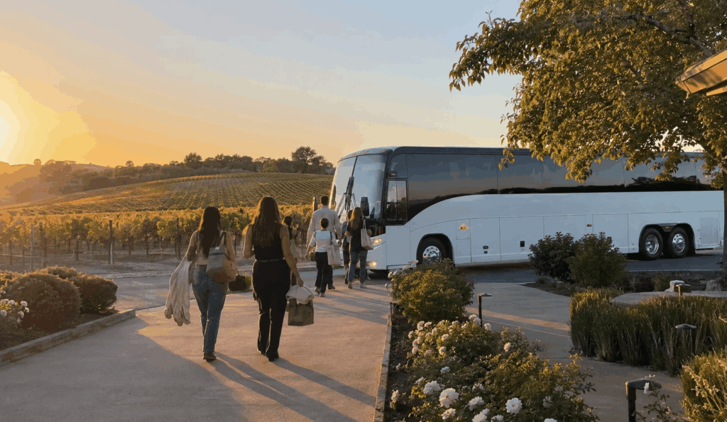 adult group enjoying a wine tasting experience at a livermore valley vineyard patio