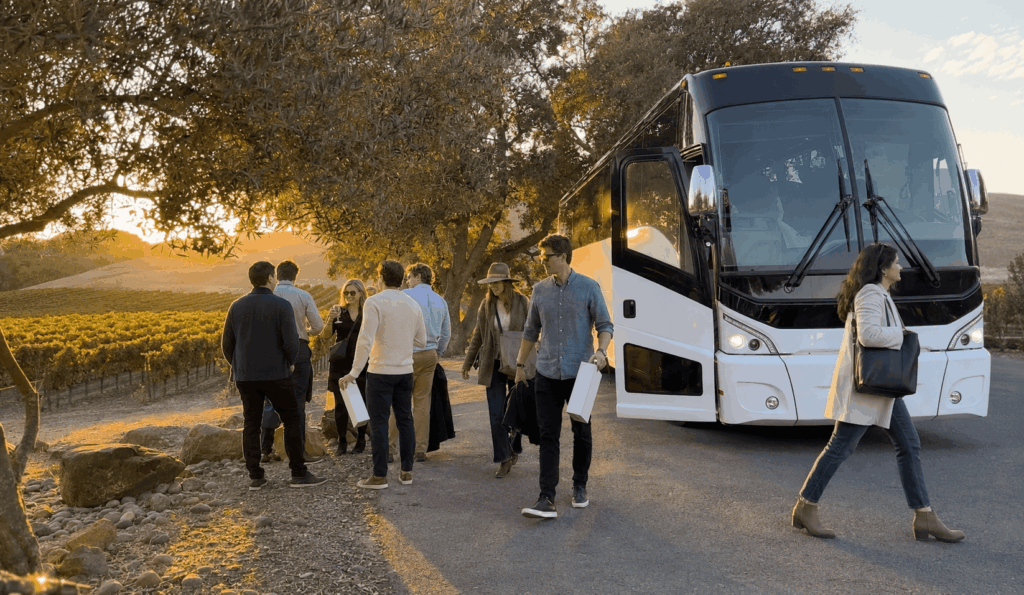 wine tasting group returning to a charter bus after visiting livermore valley wineries