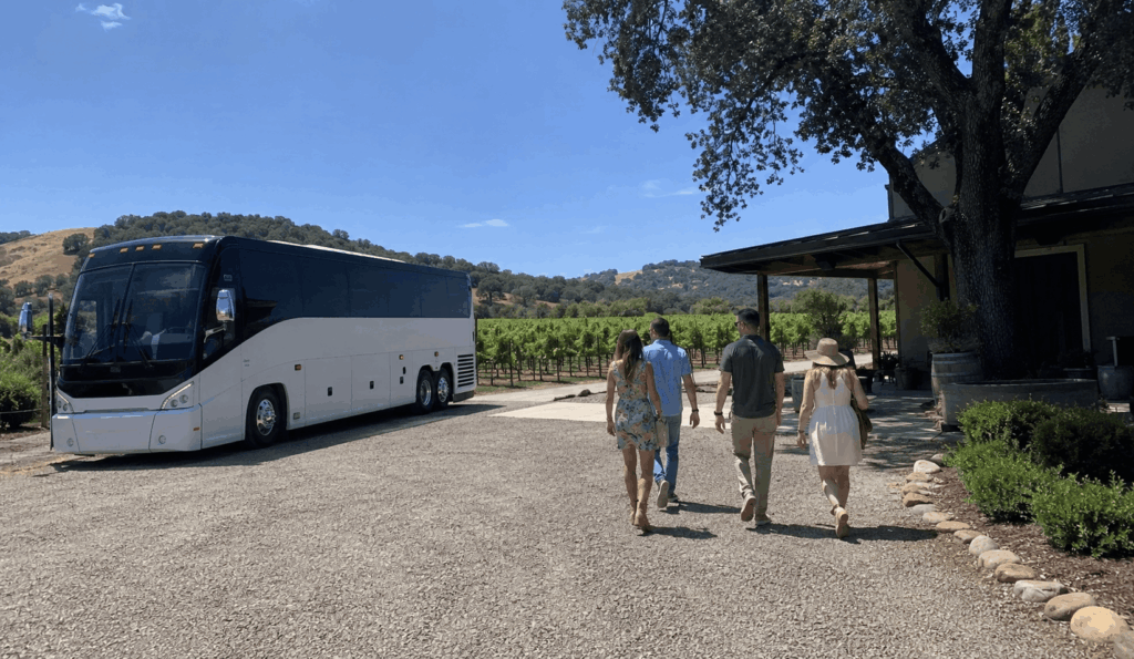 charter bus waiting outside a napa valley winery during a bottlerock weekend group trip