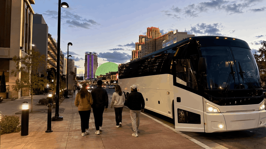 charter bus dropping off a group in downtown reno for a tahoe and reno weekend trip