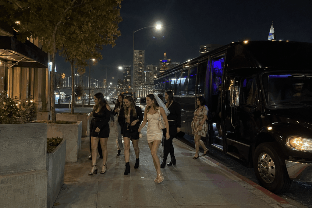 bachelorette group stepping off a party bus for a napa winery day trip from alameda