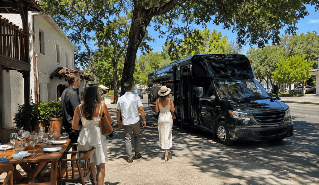 group enjoying a relaxed sonoma plaza stop with charter bus nearby during a wine country day trip